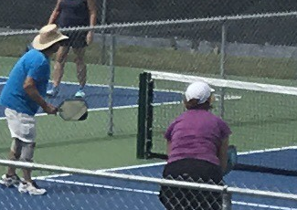 players at pickle ball courts